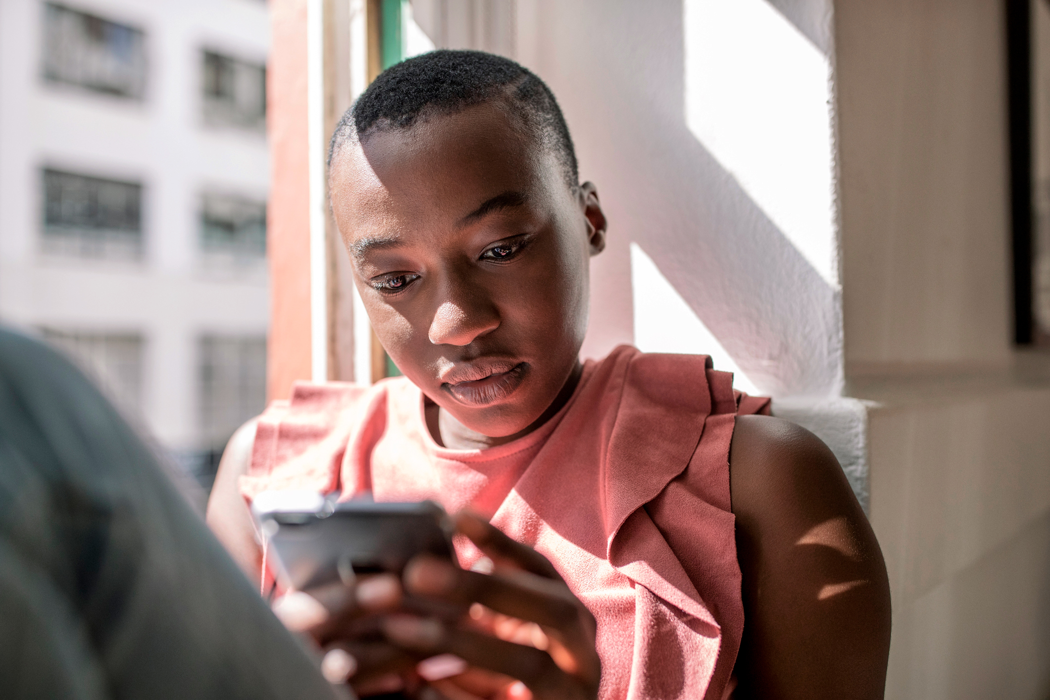 Photo of woman on her phone