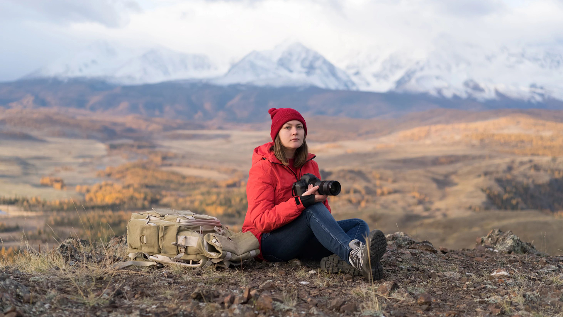 Image of woman holding camera