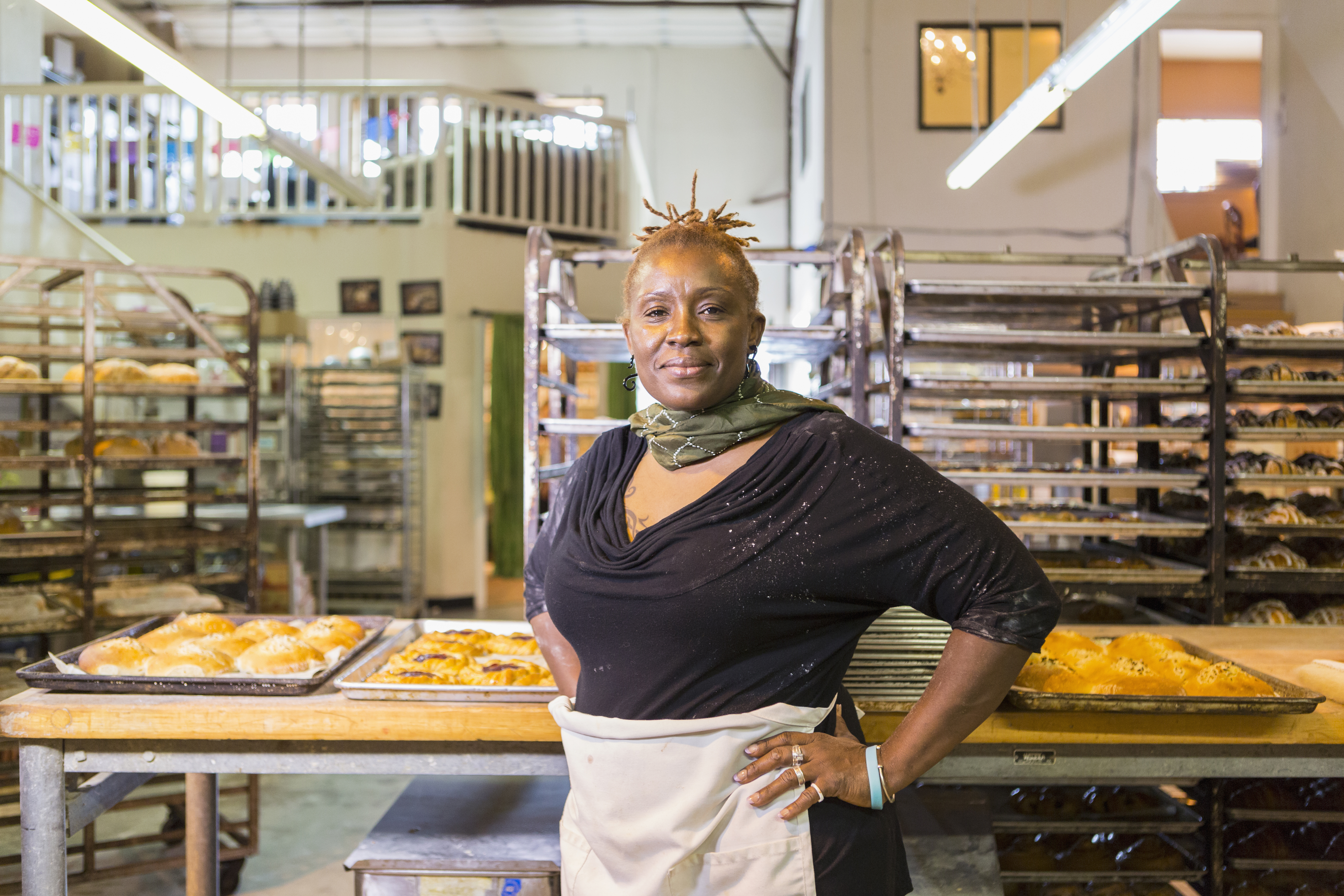 Baker standing in bakery kitchen