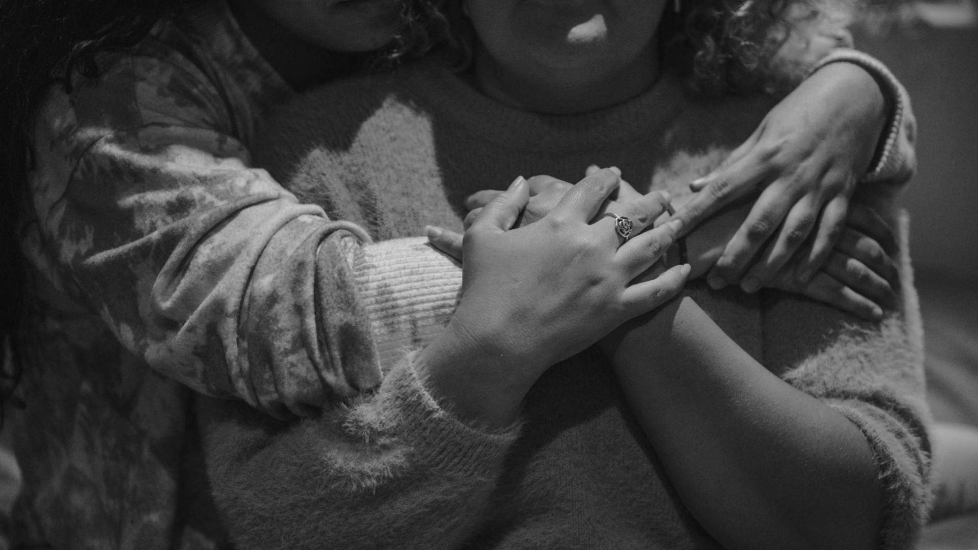 Two people hugging